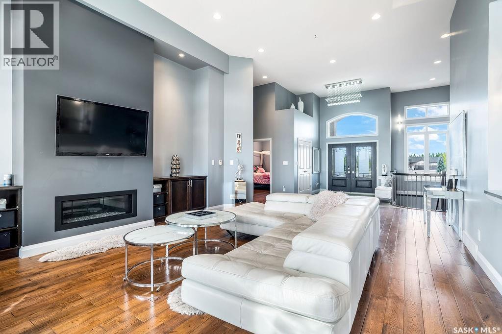 85 Hanley Way, Edenwold Rm No.158, SK - Indoor Photo Showing Living Room With Fireplace