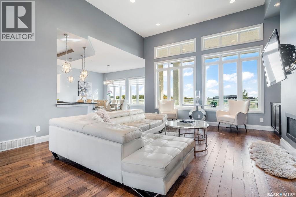 85 Hanley Way, Edenwold Rm No.158, SK - Indoor Photo Showing Living Room With Fireplace