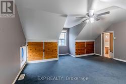 Knee Wall Storage in the Loft Bedroom -