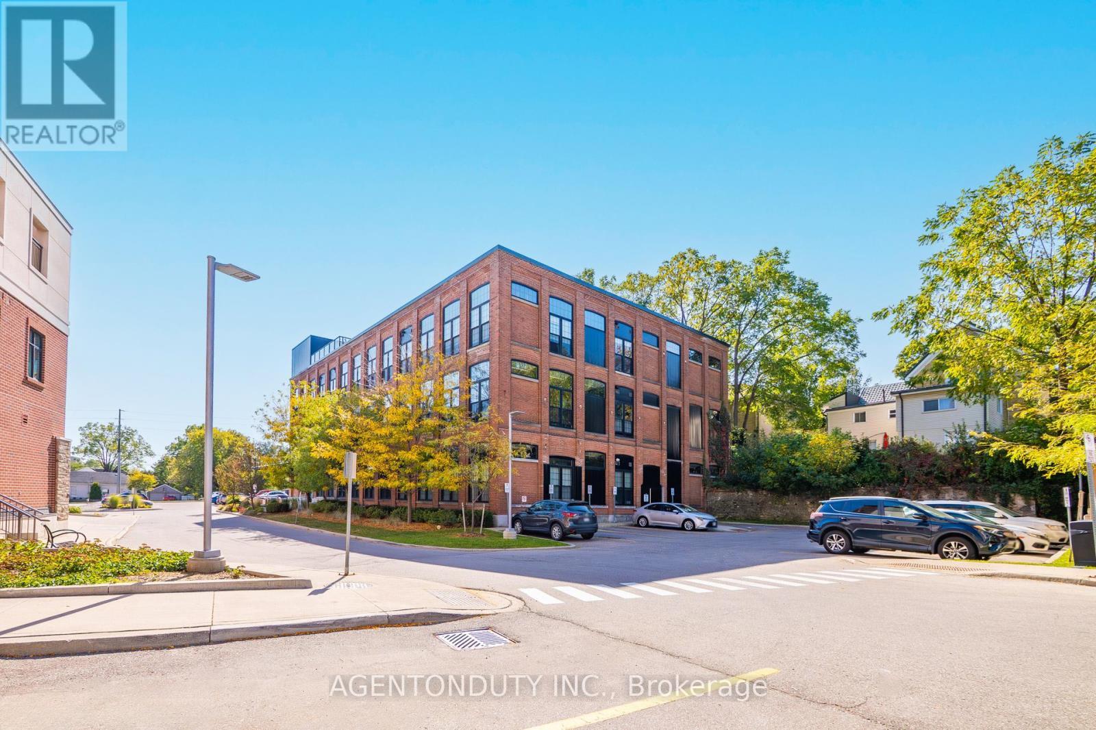 101 - 24 Cedar Street, Cambridge, ON - Outdoor With Facade