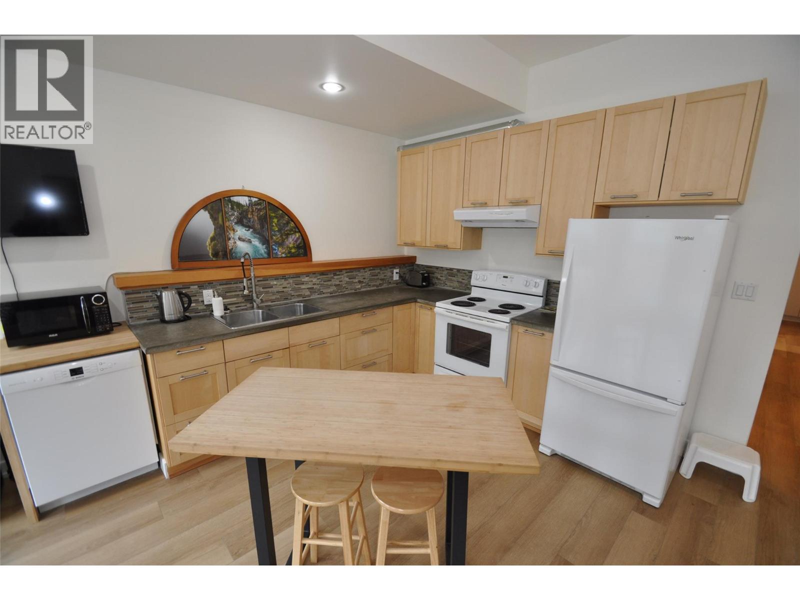 Suite - 1211 Front Street, Nelson, BC - Indoor Photo Showing Kitchen With Double Sink