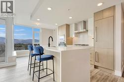 Kitchen/dining space with integrated fridge -