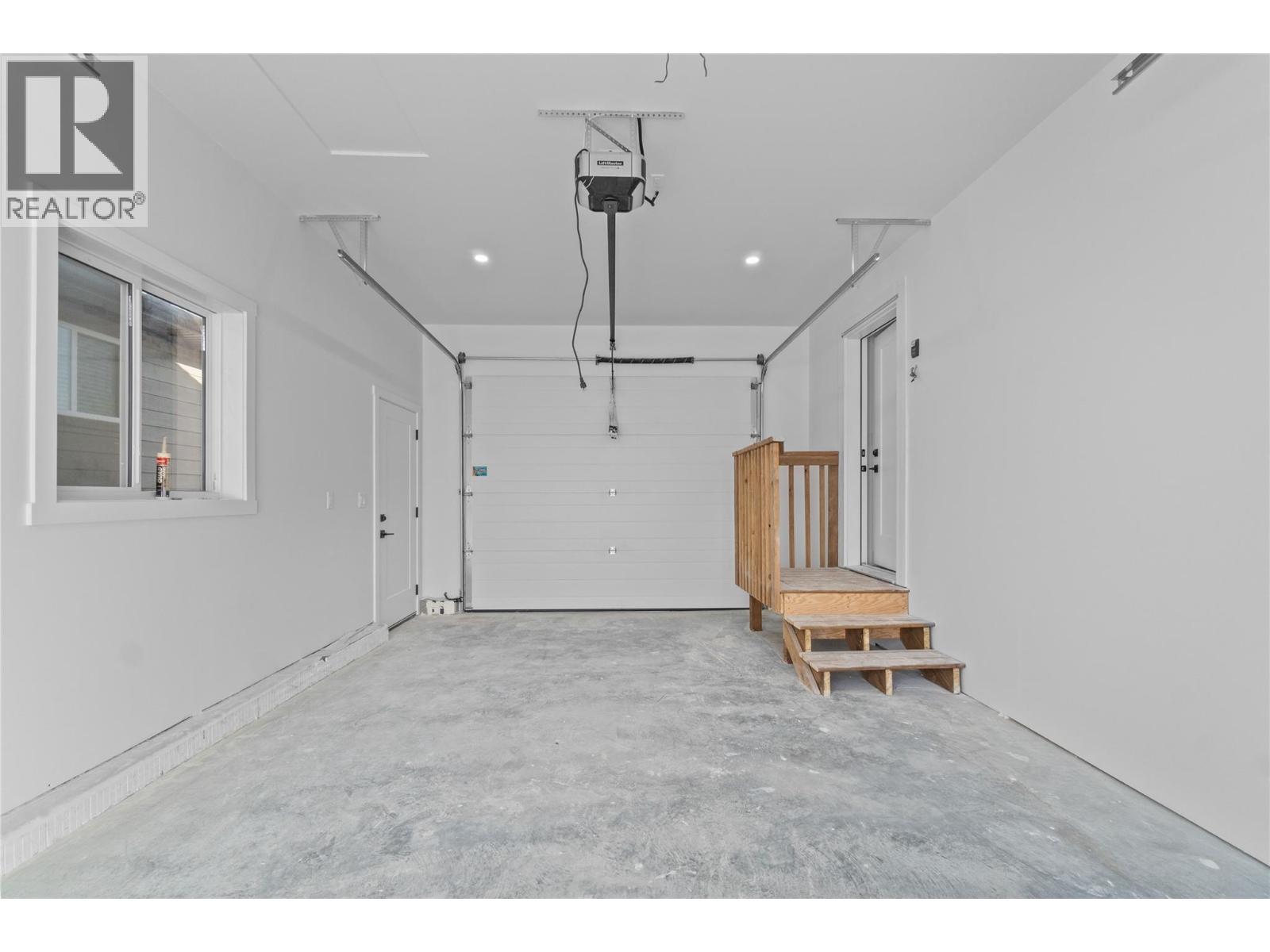 View from front of garage - 730 Elderberry Walk, Sicamous, BC