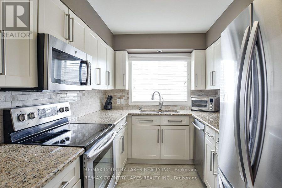15 - 24 Laguna Parkway, Ramara, ON - Indoor Photo Showing Kitchen