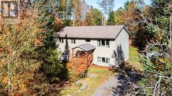 Desirable raised bungalow! Full walkout lwr level! -