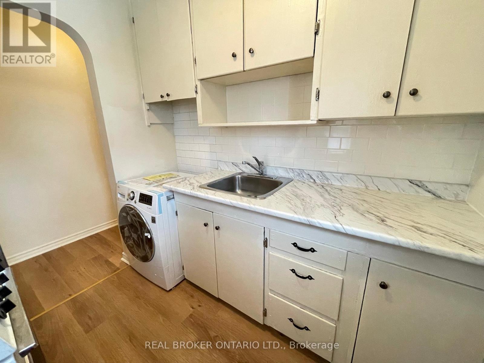 C - 204 O'Connor Drive, Toronto, ON - Indoor Photo Showing Laundry Room