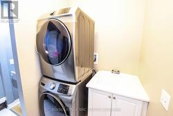 Laundry room with door to the garage -