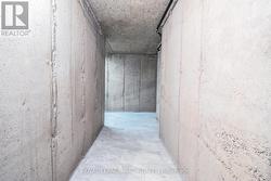 Large \"L\" shaped cold room with tiled floor -