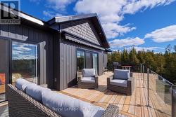 Power awning over deck -