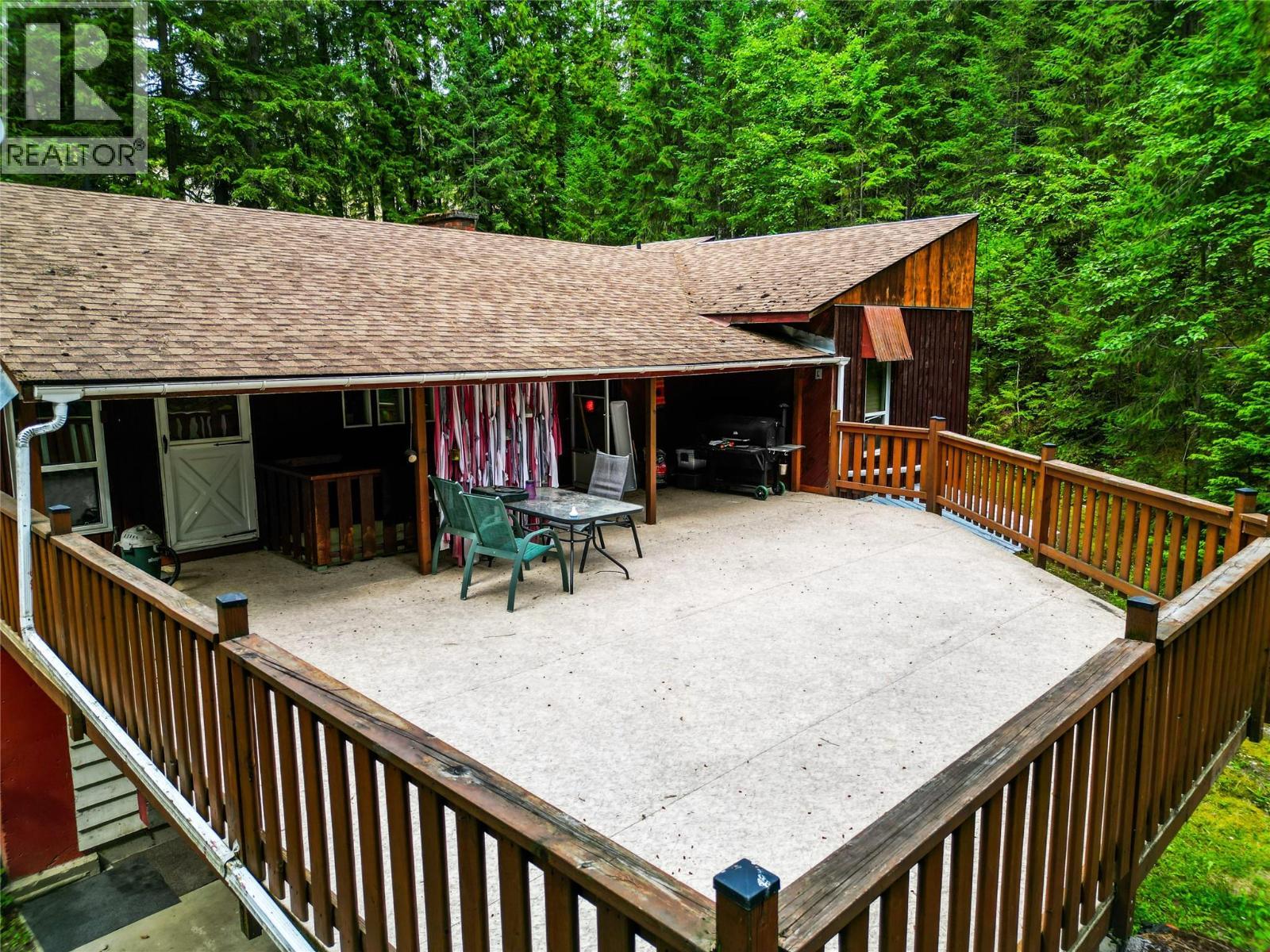 8043 97A Highway, Mara, BC - Outdoor With Deck Patio Veranda With Exterior