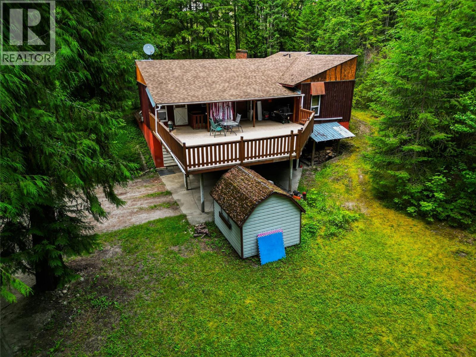 8043 97A Highway, Mara, BC - Outdoor With Deck Patio Veranda