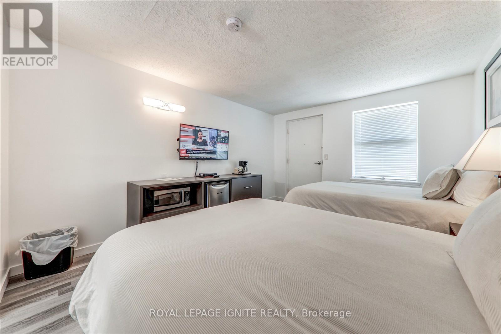 212 - 70 Port Darlington Road, Clarington, ON - Indoor Photo Showing Bedroom