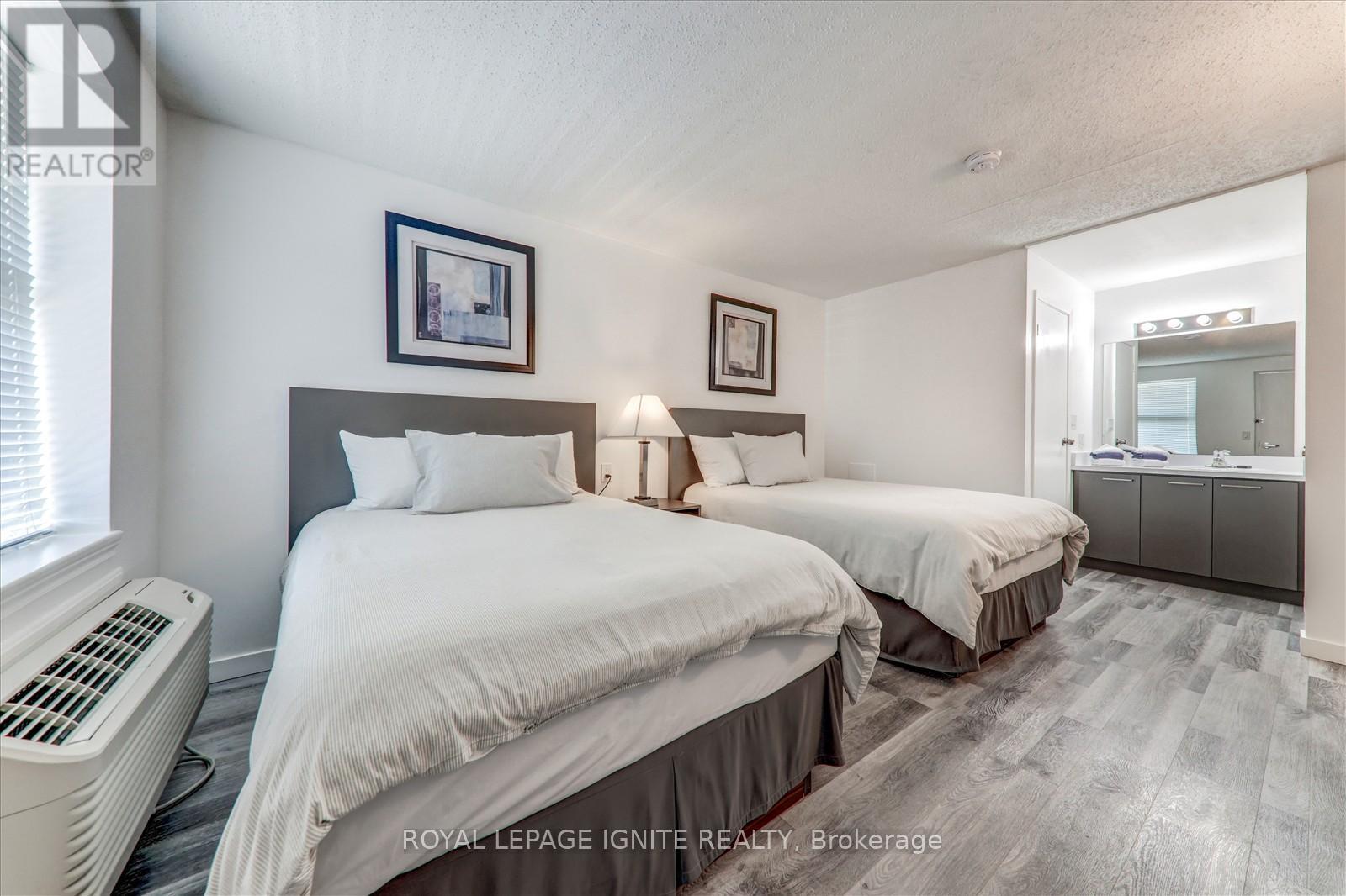 212 - 70 Port Darlington Road, Clarington, ON - Indoor Photo Showing Bedroom