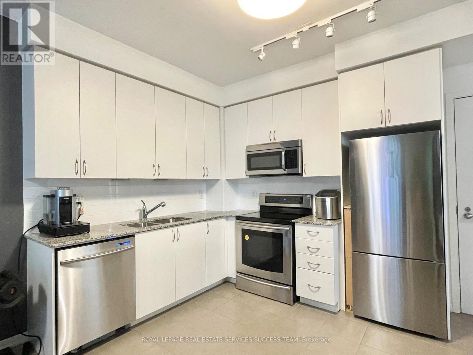 241 - 36 Via Bagnato Street, Toronto, ON - Indoor Photo Showing Kitchen With Double Sink