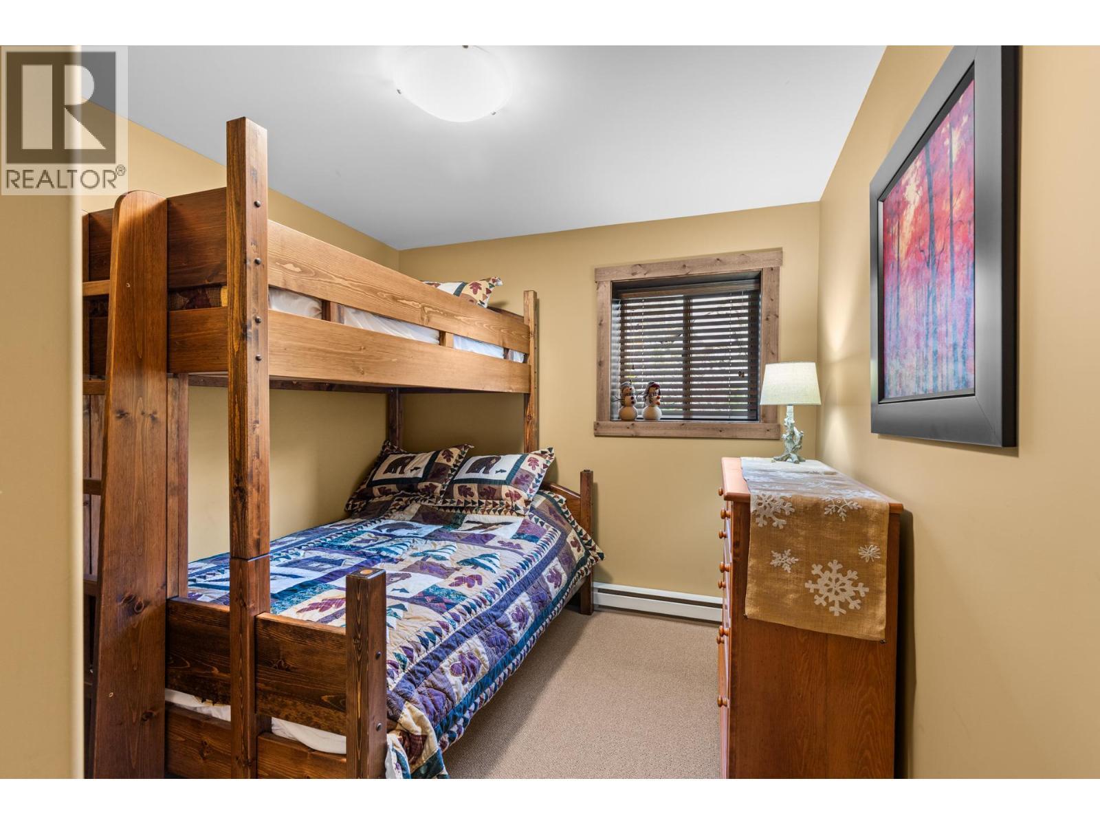 3rd bedroom on 2nd level - 50 Forest Lane Unit# A Lot# 22, Big White, BC - Indoor Photo Showing Bedroom