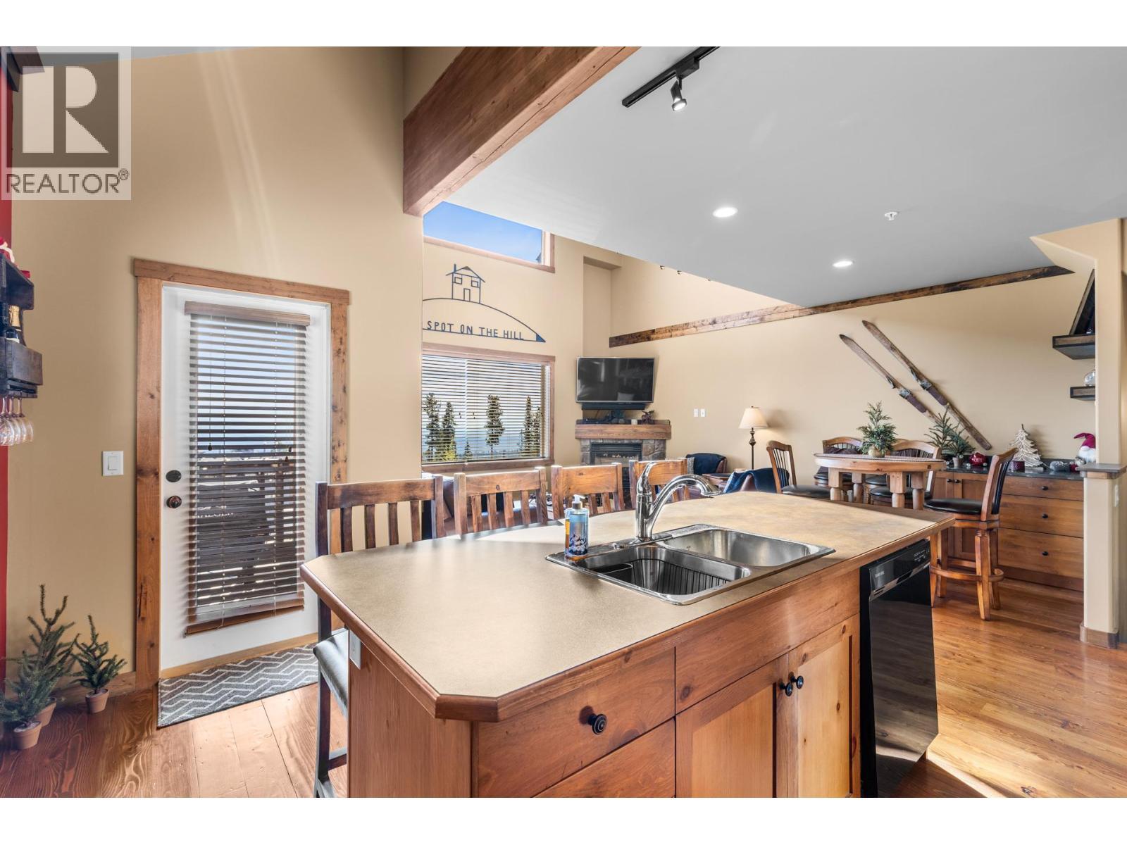 Door from main level to deck - 50 Forest Lane Unit# A Lot# 22, Big White, BC - Indoor Photo Showing Other Room