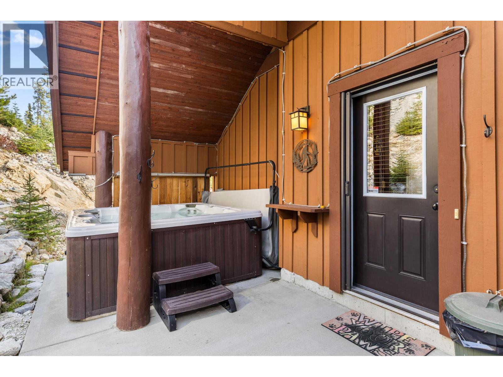 Back covered patio - 50 Forest Lane Unit# A Lot# 22, Big White, BC - With Exterior