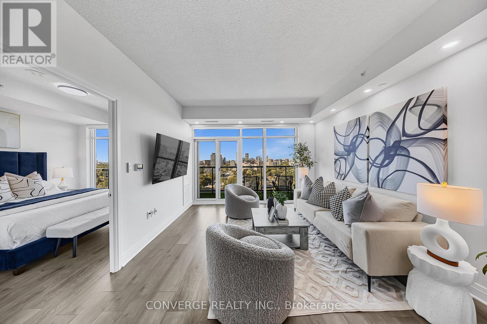 1310 - 3220 Sheppard Avenue E, Toronto, ON - Indoor Photo Showing Living Room