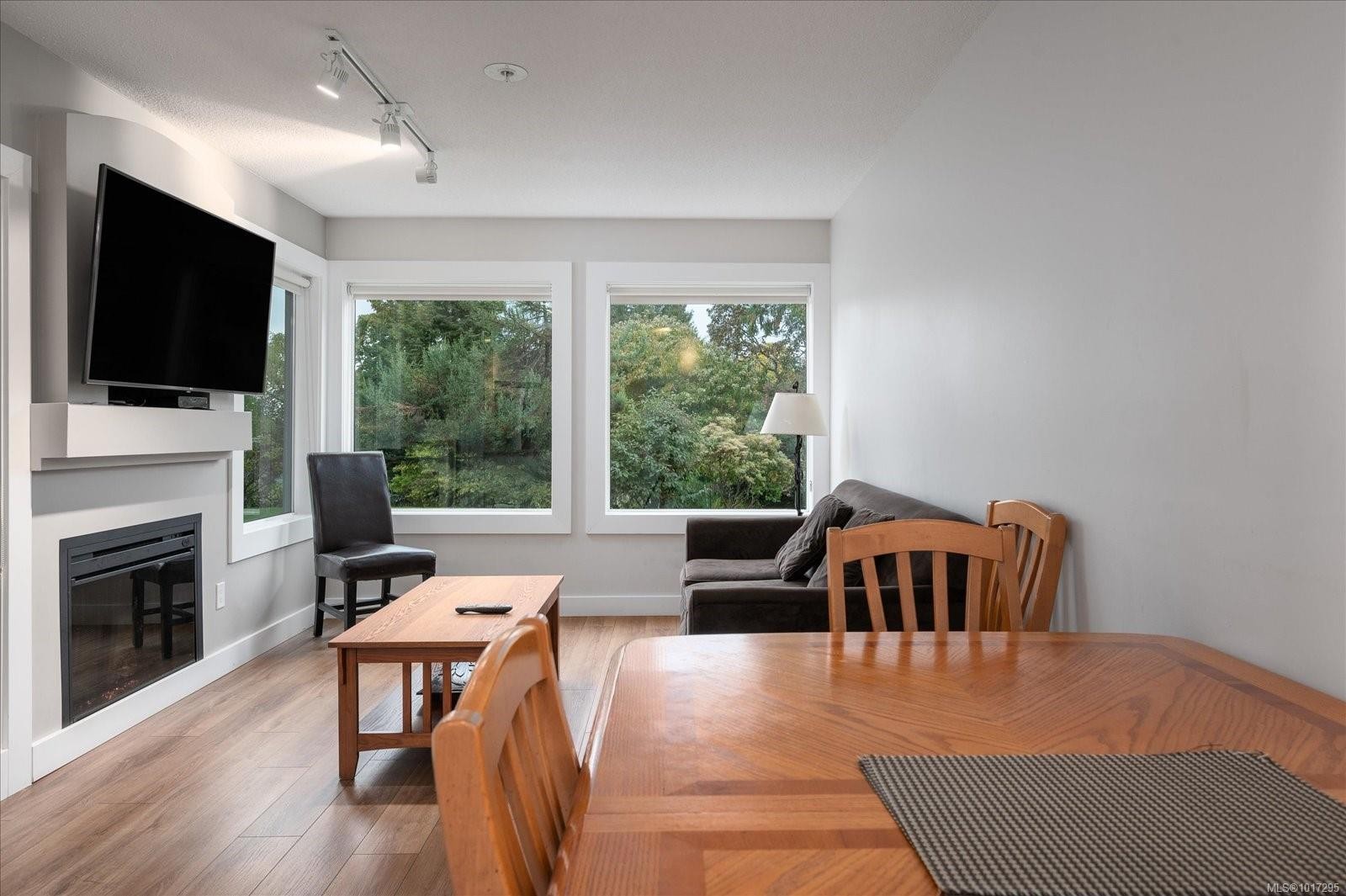 712-1600 Stroulger Rd, Nanoose Bay, BC - Indoor Photo Showing Dining Room With Fireplace