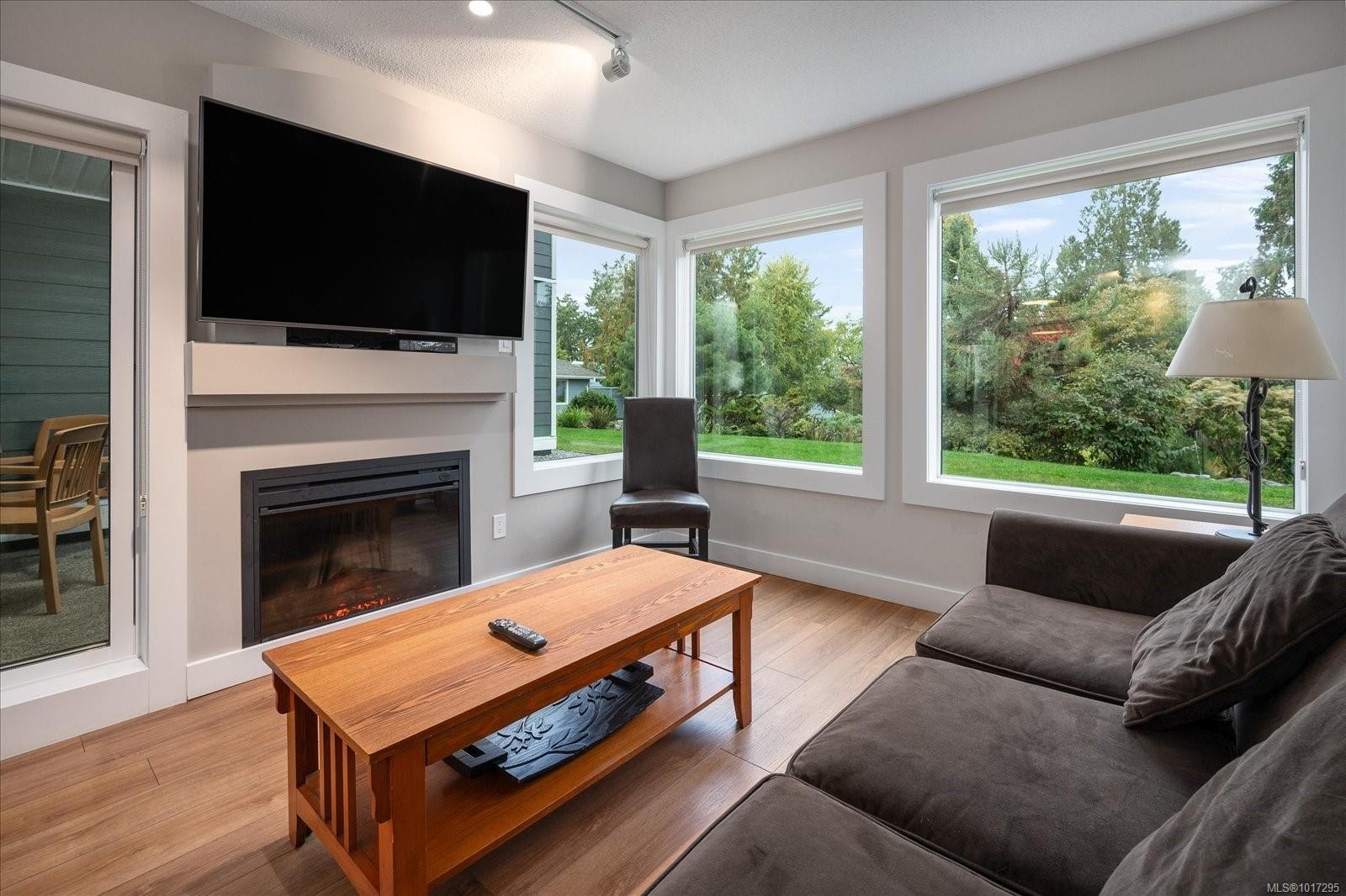 712-1600 Stroulger Rd, Nanoose Bay, BC - Indoor Photo Showing Living Room With Fireplace