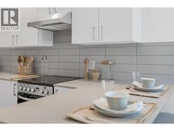 Kitchen- Photos are of a similar home; some features may vary -