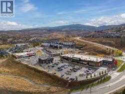 Aerial photo of shopping mall and Ascent behind shopping mall -