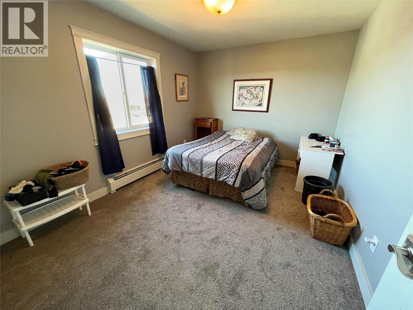 4803 46 Avenue, Pouce Coupe, BC - Indoor Photo Showing Bedroom