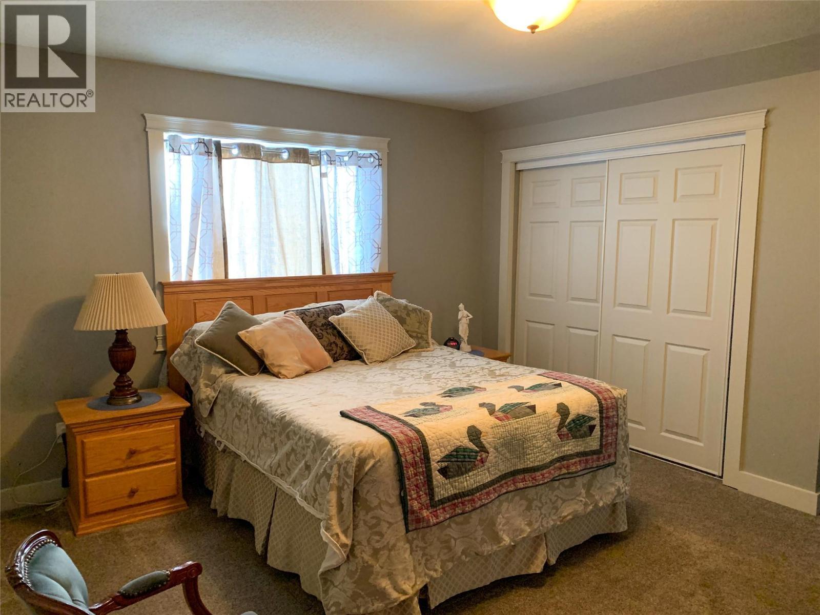 4803 46 Avenue, Pouce Coupe, BC - Indoor Photo Showing Bedroom