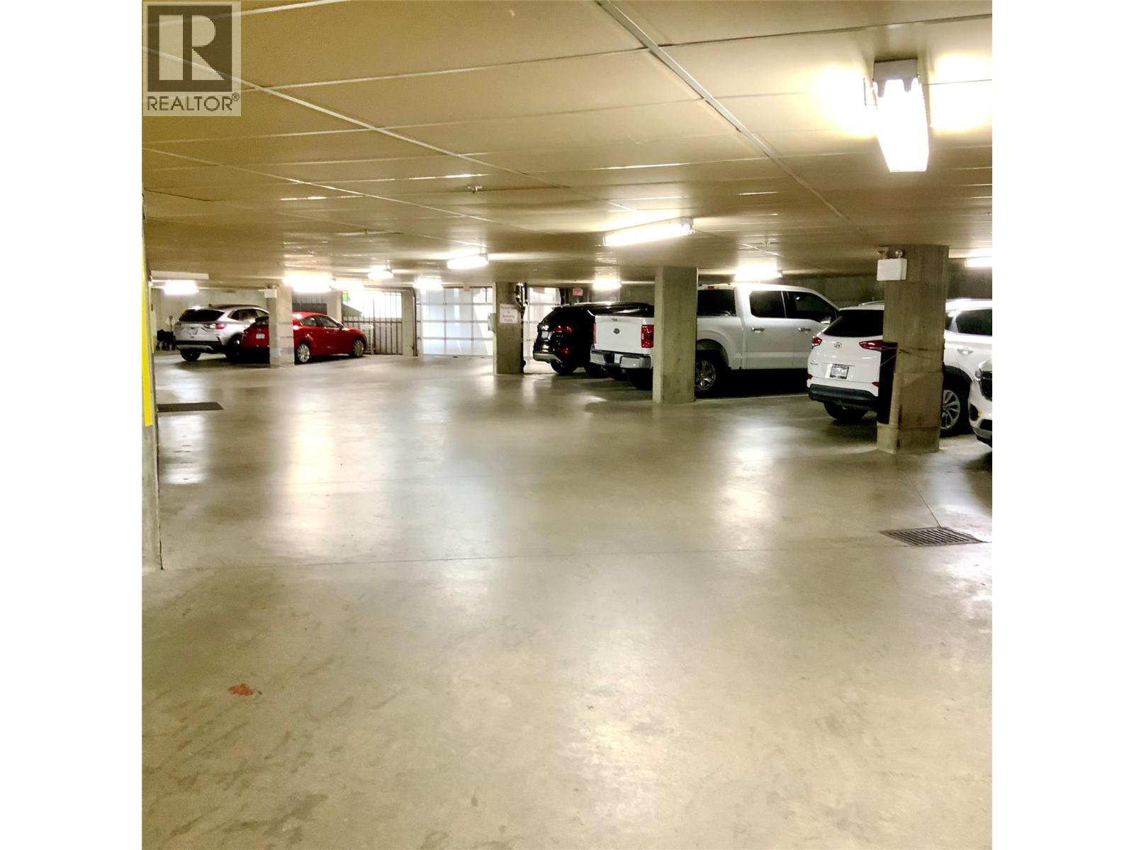 underground parkade - 3300 Centennial Drive Unit# 411, Vernon, BC - Indoor Photo Showing Garage