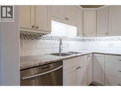 Bosch dishwasher, under counter lighting, full tile backsplash -