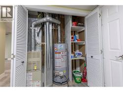 Furnace and Hot water tank in laundry room -