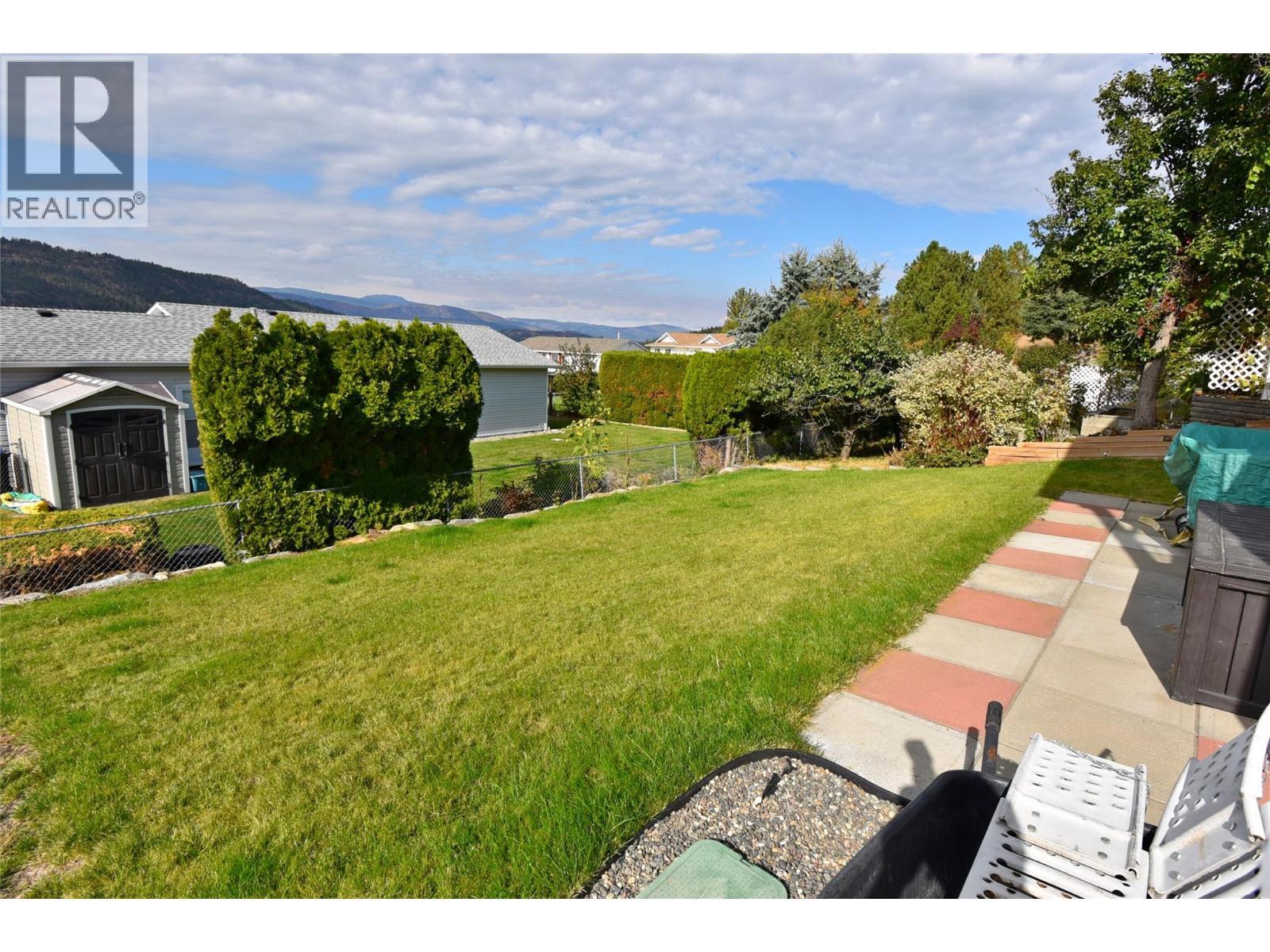 Views of the back yard - 6427 Spencer Road, Kelowna, BC - Outdoor