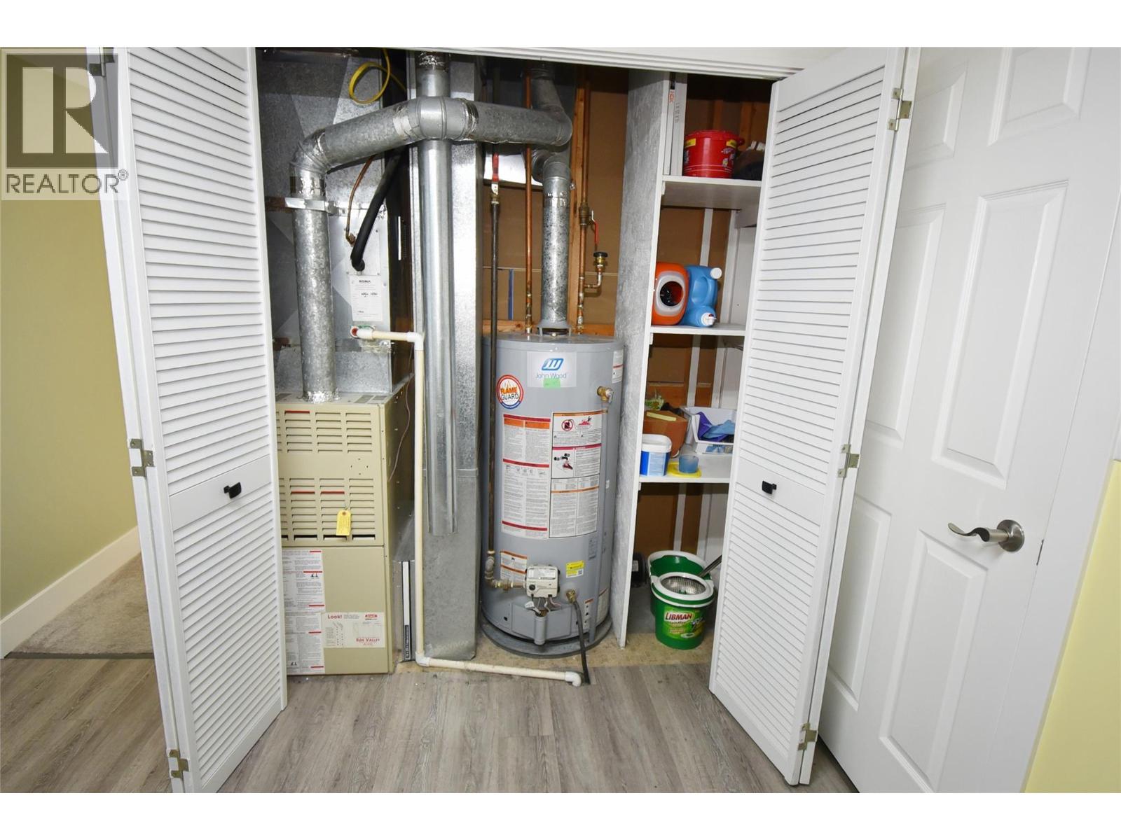 Mechanical area in laundry room - 6427 Spencer Road, Kelowna, BC - Indoor Photo Showing Basement