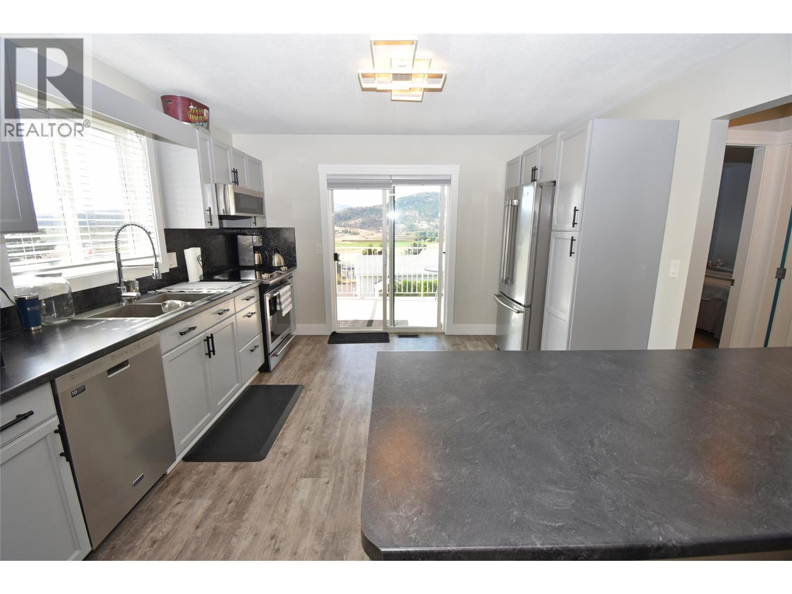 Updated kitchen - 6427 Spencer Road, Kelowna, BC - Indoor Photo Showing Kitchen