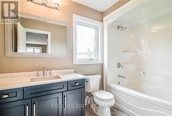 Main bathroom on upper level -