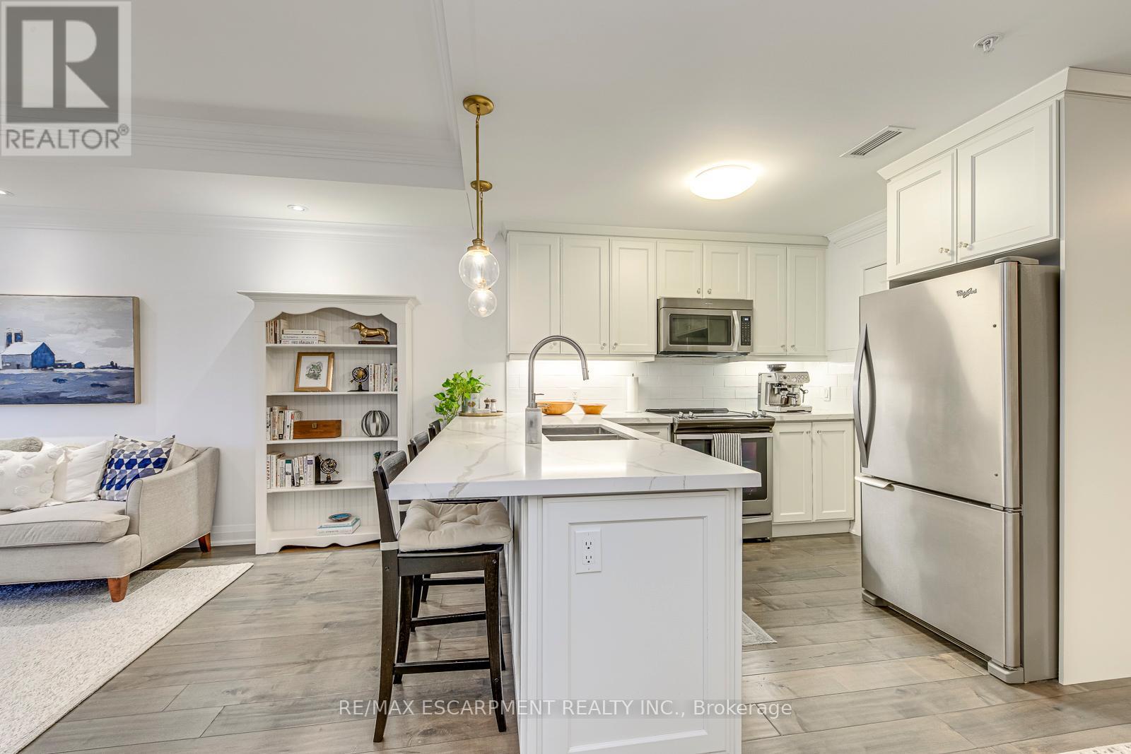 401 - 70 Stewart Street, Oakville, ON - Indoor Photo Showing Kitchen With Stainless Steel Kitchen With Double Sink