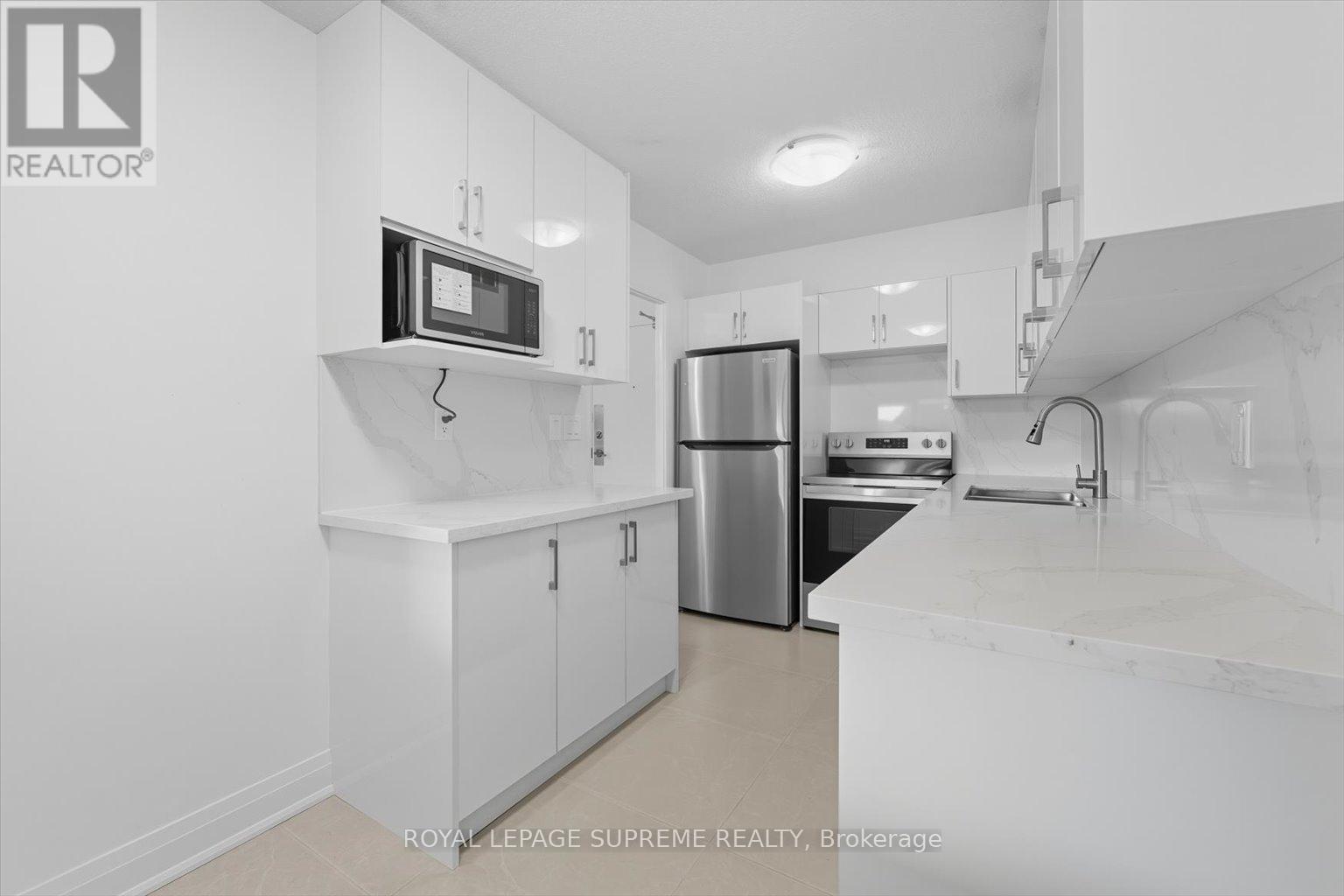 New Kitchen And Floor - 107 - 270 Scarlett Road, Toronto, ON - Indoor Photo Showing Kitchen