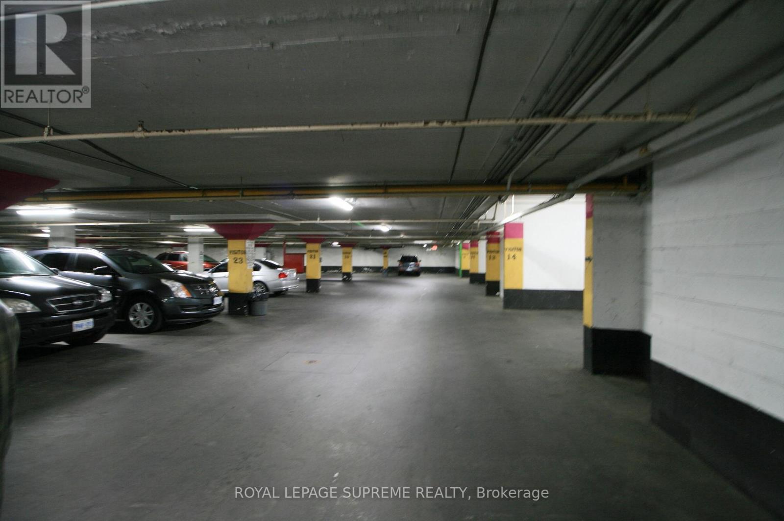 Visitor Parking Area - 107 - 270 Scarlett Road, Toronto, ON - Indoor Photo Showing Garage