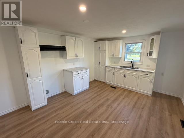 1 - 40201 Vanastra Road, Huron East (Vanastra), ON - Indoor Photo Showing Kitchen With Double Sink