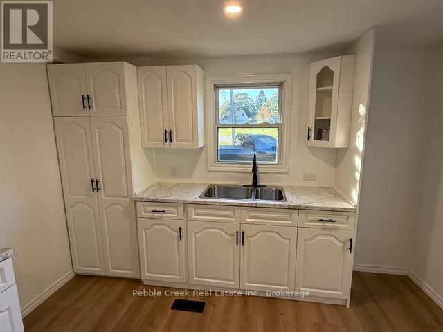 1 - 40201 Vanastra Road, Huron East (Vanastra), ON - Indoor Photo Showing Kitchen With Double Sink