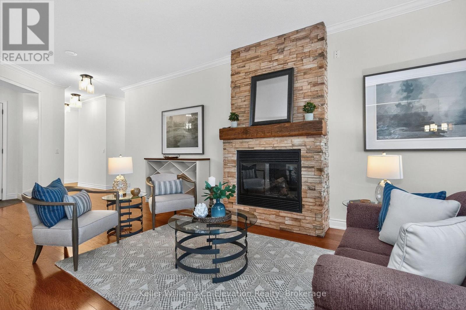 Living Rm w Gas Fireplace - Lph01 - 699 Aberdeen Boulevard, Midland, ON - Indoor Photo Showing Living Room With Fireplace
