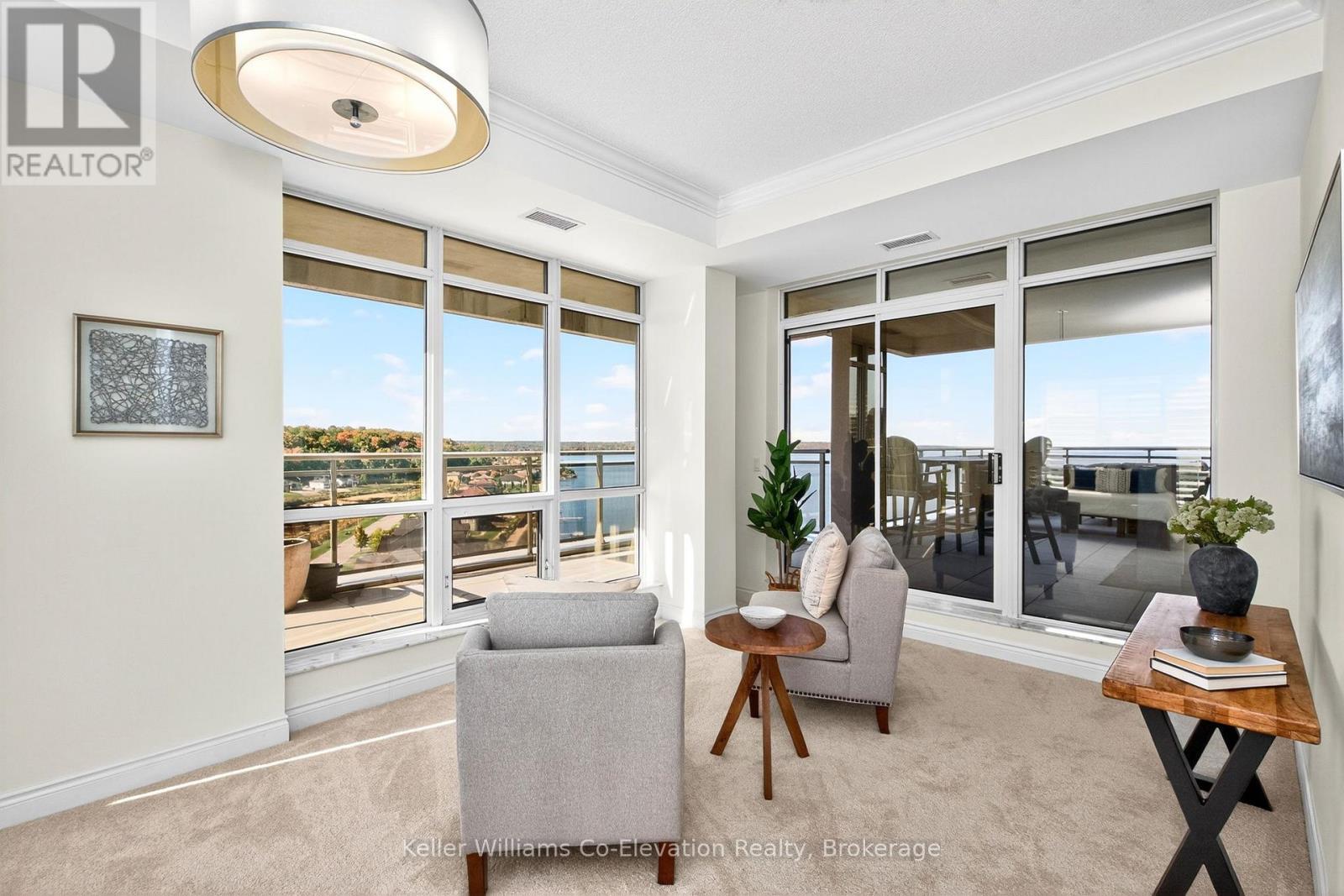 Sitting Area w/Walkout to Large Balcony - Lph01 - 699 Aberdeen Boulevard, Midland, ON - Indoor Photo Showing Living Room