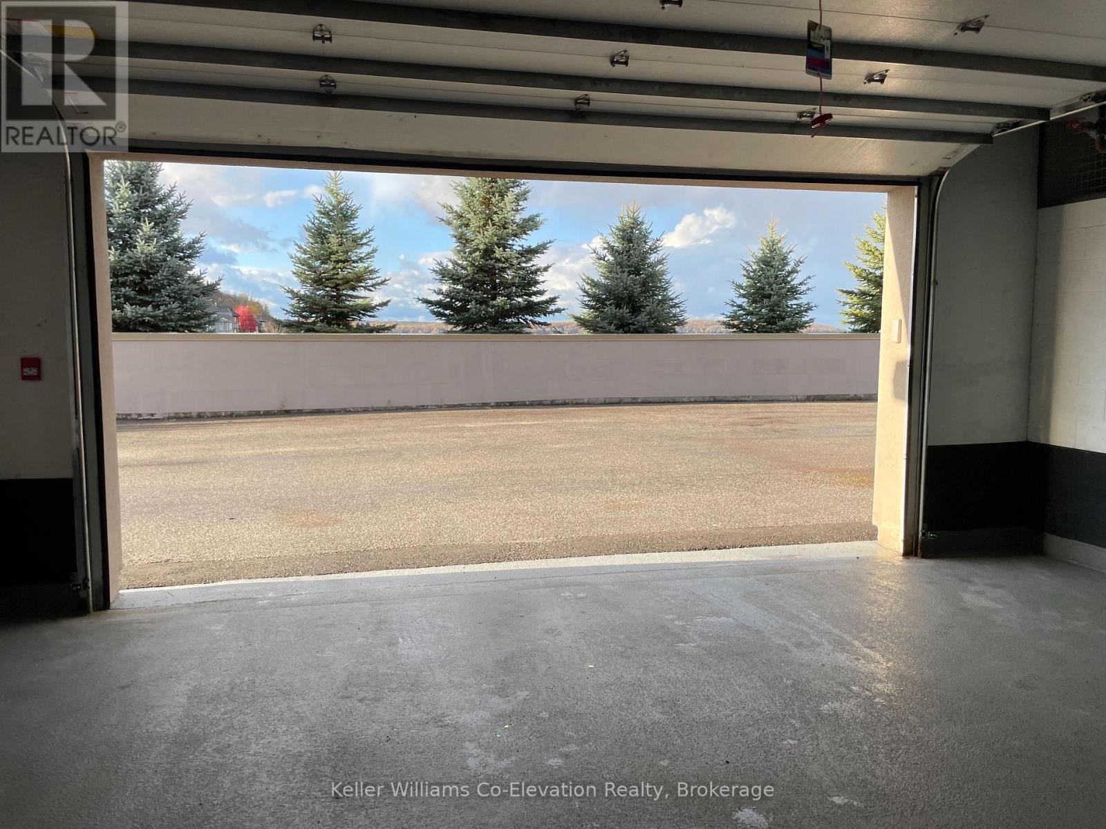 Inside Private Double Garage - Lph01 - 699 Aberdeen Boulevard, Midland, ON - Indoor Photo Showing Garage