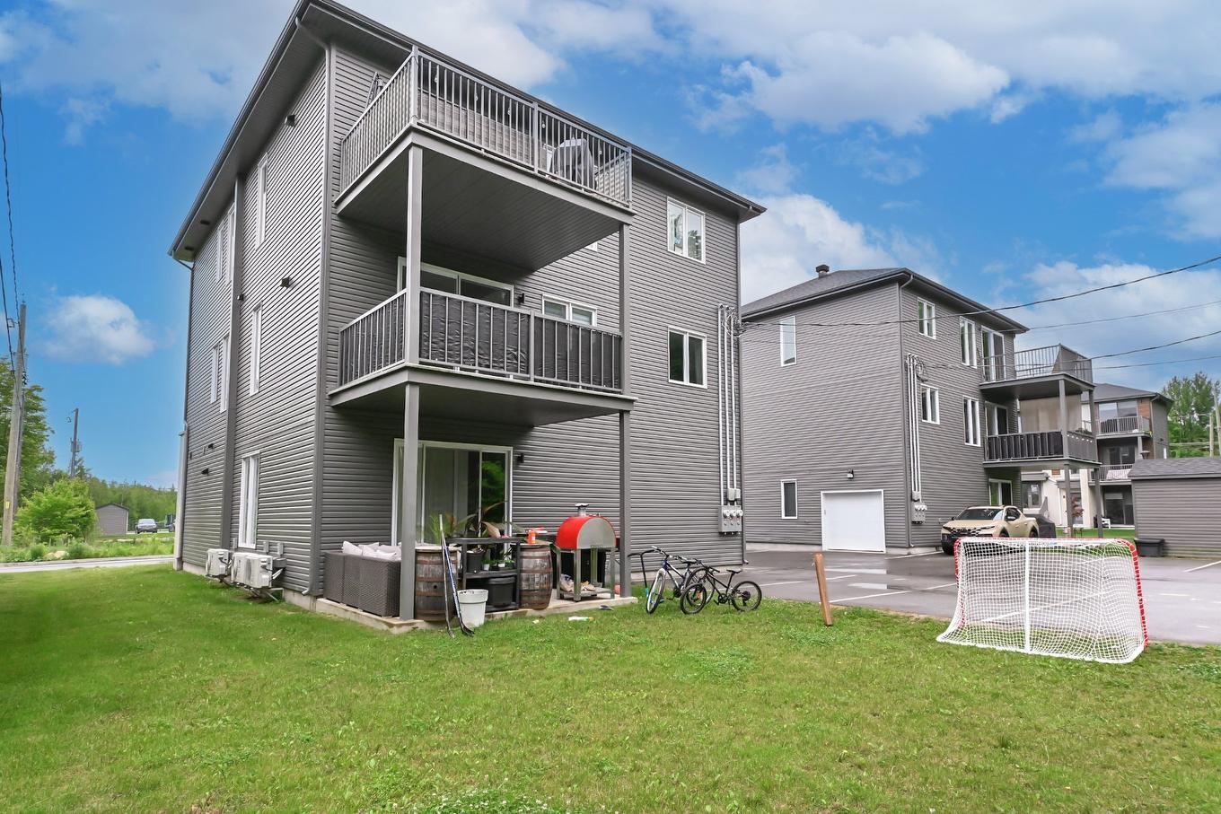 Face arrière - 13570 - 13574 Rue Du Grenache, Mirabel, QC - Outdoor With Exterior