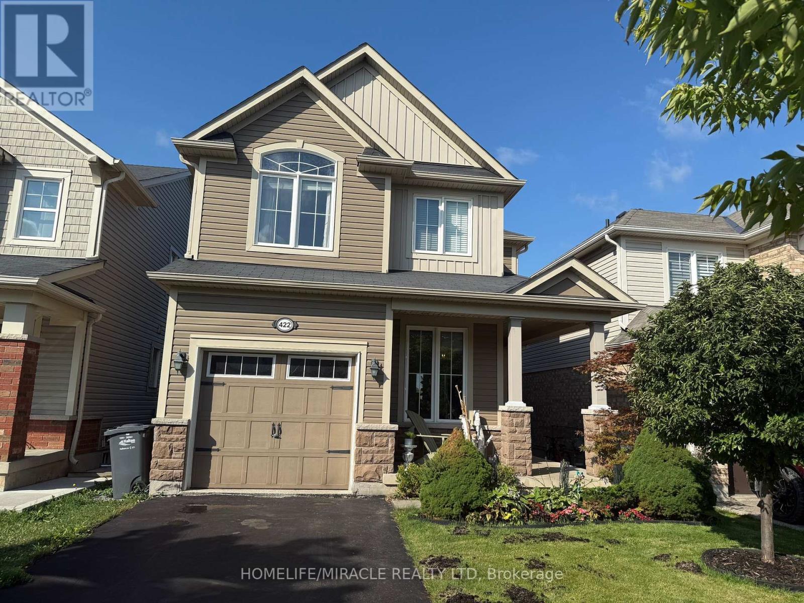 422 Cavanagh Lane, Milton, ON - Outdoor With Facade