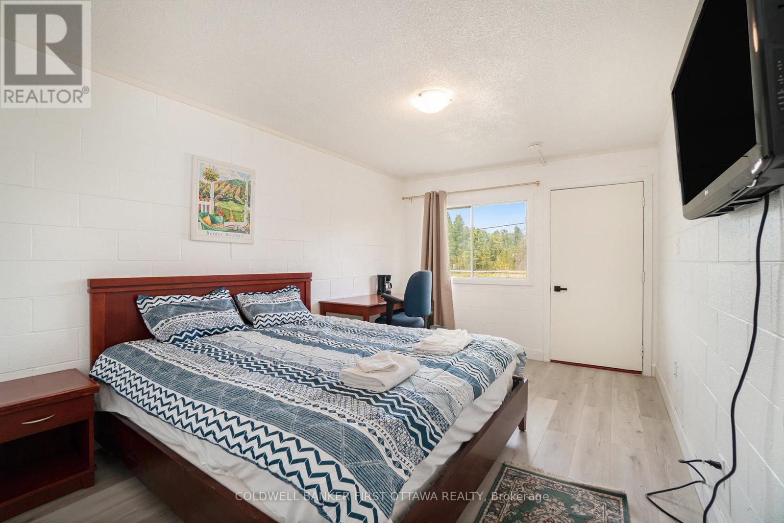 9628 Hwy 509, North Frontenac (Frontenac North), ON - Indoor Photo Showing Bedroom