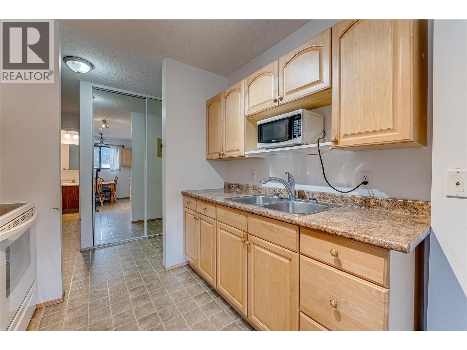 409 Main Street Unit# 206, Sicamous, BC - Indoor Photo Showing Kitchen With Double Sink