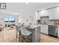 Kitchen & Dining- Photos are of a similar home; some features may vary -