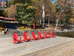 Small Dock with sandy shoreline. -