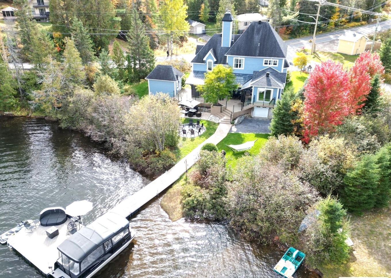 Aerial photo - 10 Rue De L'Aqueduc, Saint-Alphonse-Rodriguez, QC - Outdoor With Body Of Water